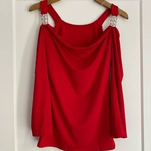 Red shoulder cut out long sleeve blouse.
